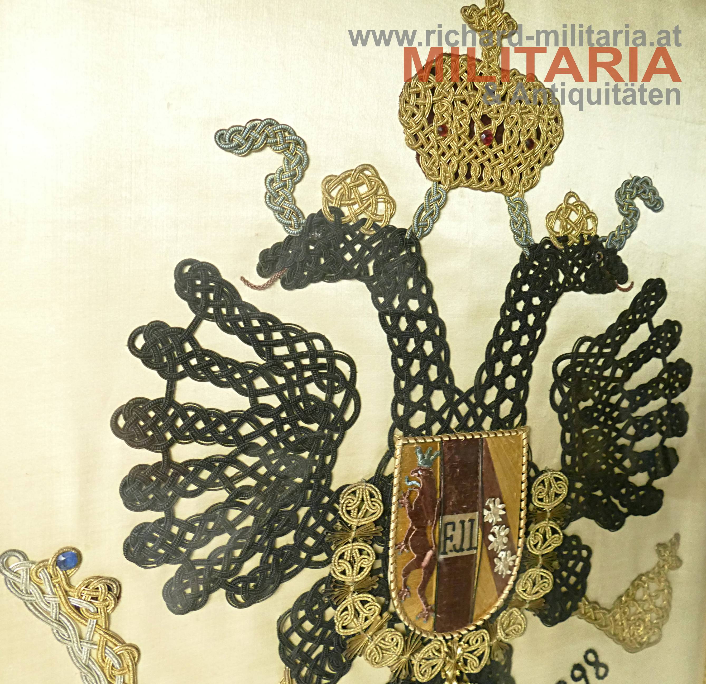 k.u.k. patriotische Stickerei hinter Glas "1848-1898"