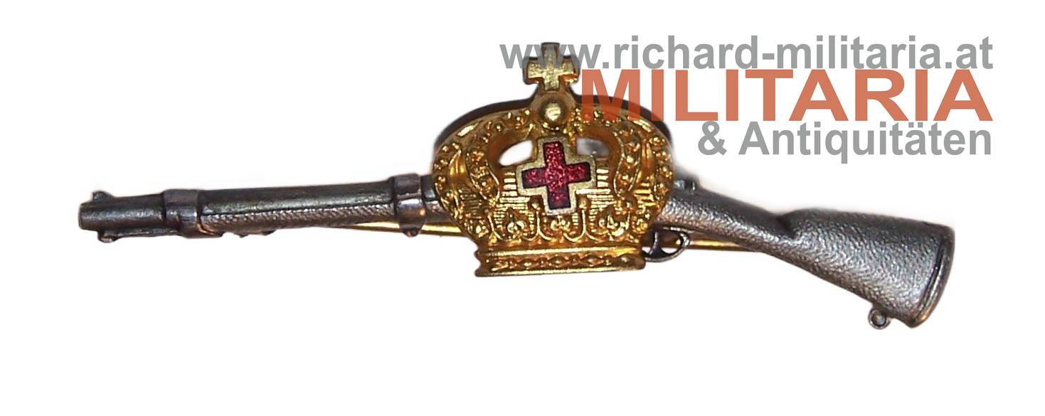 Abzeichen - Gewehr mit rotem Kreuz